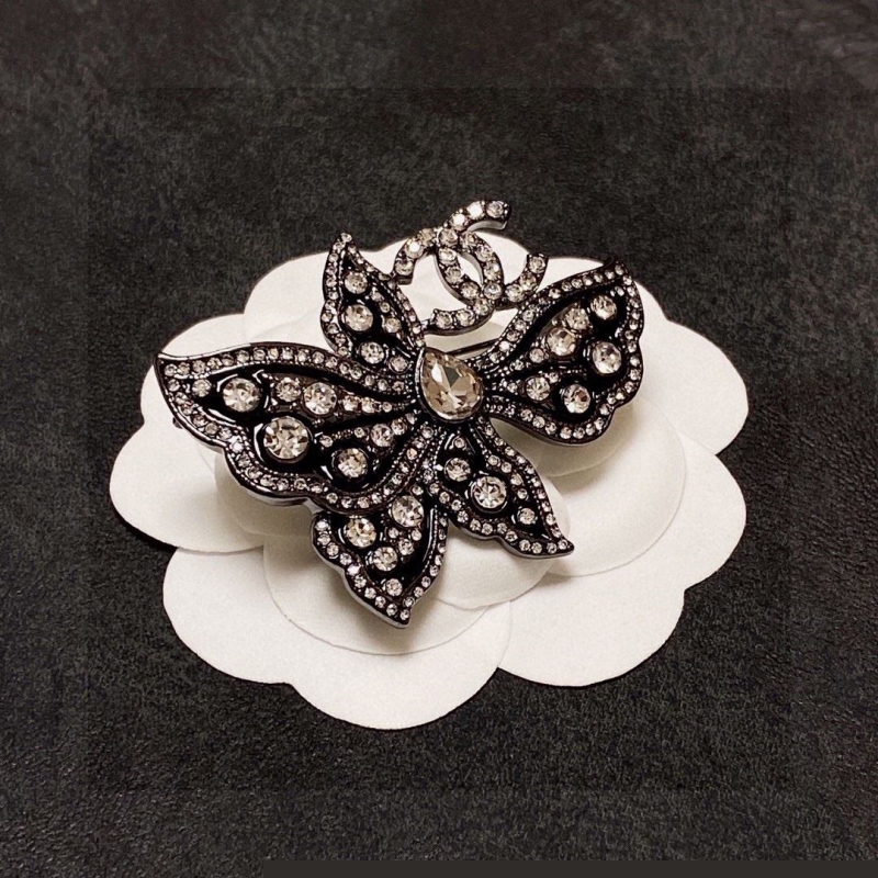 Ch*el brooches